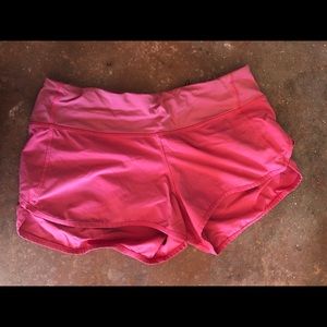 Pink Lululemon running shorts
